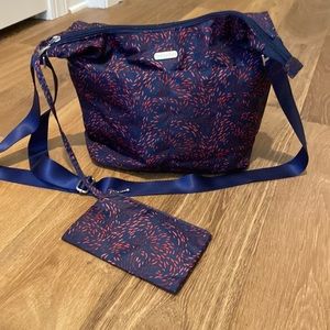 Baggallini secure travel crossbody in brand new condition with small wristlet